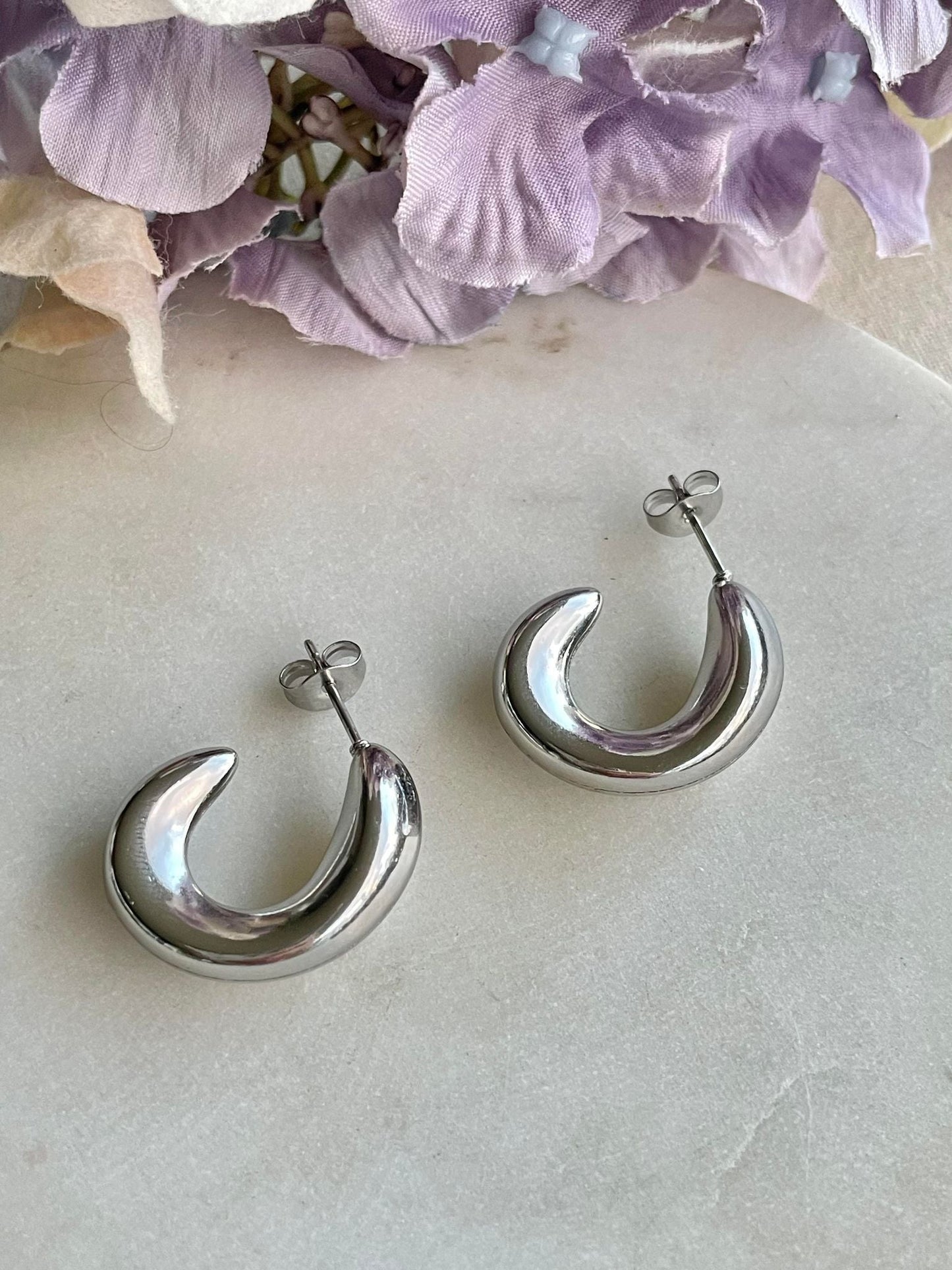 Oblong silver hoop earring